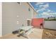 Backyard patio with picnic table and grill, perfect for outdoor dining at 503 30Th Ave. N, Myrtle Beach, SC 29577