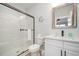 Modern bathroom with a frameless glass shower and white vanity at 503 30Th Ave. N, Myrtle Beach, SC 29577