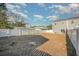 Large backyard with a fenced area and grassy lawn at 503 30Th Ave. N, Myrtle Beach, SC 29577