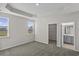 Bright bedroom with carpet, walk-in closet, and ensuite bathroom access at 3001 Deerberry Place, Longs, SC 29568