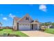 Charming house with gray siding, white trim, and a two-car garage at 1216 Colusa Ct., Little River, SC 29566