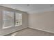 Bright bedroom with two large windows offering natural light and a view at 1216 Colusa Ct., Little River, SC 29566