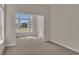 Sunlit office featuring large windows and carpet flooring at 1216 Colusa Ct., Little River, SC 29566