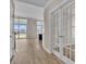 Spacious entryway with French doors and hardwood flooring at 1216 Colusa Ct., Little River, SC 29566