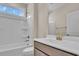 Bathroom with shower/tub combo and gold fixtures at 1216 Colusa Ct., Little River, SC 29566