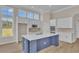 Modern kitchen boasting an island and white shaker cabinets at 1216 Colusa Ct., Little River, SC 29566