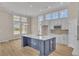 Modern kitchen with large island and ample natural light at 1216 Colusa Ct., Little River, SC 29566