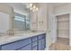 Primary bathroom with a double vanity and a walk-in closet at 1216 Colusa Ct., Little River, SC 29566