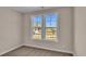 Bedroom with double window and carpet at 1216 Colusa Ct., Little River, SC 29566