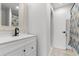 Clean bathroom with white vanity and updated shower at 601 38Th Ave. N # C-6, Myrtle Beach, SC 29577