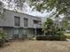 Two-story building exterior with grey siding and a balcony at 178 Salt Marsh Circle # 30F, Pawleys Island, SC 29585