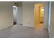 Bright bedroom with carpeted floors and a large closet at 178 Salt Marsh Circle # 30F, Pawleys Island, SC 29585