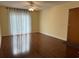 Living room with hardwood floors and sliding glass doors at 178 Salt Marsh Circle # 30F, Pawleys Island, SC 29585