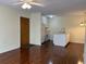 Living room with hardwood floors and open concept kitchen at 178 Salt Marsh Circle # 30F, Pawleys Island, SC 29585