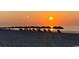 Beachfront property with sunrise view and rows of beach chairs and umbrellas at 2711 S Ocean Blvd. S # 1421, North Myrtle Beach, SC 29582