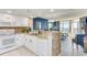 Open concept kitchen with granite counters and ocean view at 2711 S Ocean Blvd. S # 1421, North Myrtle Beach, SC 29582
