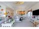 Bright and airy living room with comfortable seating and large windows at 1100 Commons Blvd. # 713, Myrtle Beach, SC 29572