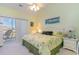 King-size bedroom with private balcony access and ocean view at 1100 Commons Blvd. # 713, Myrtle Beach, SC 29572