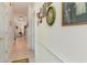 Clean hallway with tile floors and framed photos at 1100 Commons Blvd. # 713, Myrtle Beach, SC 29572