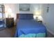 Cozy bedroom with a double bed, nightstands, and lamps at 302 71St Ave. N # 503, Myrtle Beach, SC 29572