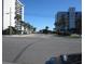 View of street leading to the oceanfront community at 302 71St Ave. N # 503, Myrtle Beach, SC 29572