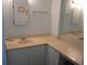 Bathroom with double vanity and a large mirror at 302 71St Ave. N # 503, Myrtle Beach, SC 29572