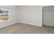 Well-lit bedroom featuring a window and a closet at 1762 Whispering Pine St., Ocean Isle Beach, NC 28469