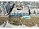 Aerial showing condo complex near beach and boardwalk at 5600 N Ocean Blvd. # C2, North Myrtle Beach, SC 29582