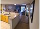 Open kitchen with granite countertops and wooden cabinets at 7100 N Ocean Blvd. # 219, Myrtle Beach, SC 29572