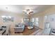 Bright and airy living room with comfortable seating and a ceiling fan at 35 Delray Dr. # 1-D, Murrells Inlet, SC 29576