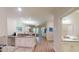 Open kitchen with granite countertops and stainless steel appliances at 35 Delray Dr. # 1-D, Murrells Inlet, SC 29576