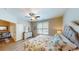 Main bedroom with a king-size bed and access to the living room at 35 Delray Dr. # 1-D, Murrells Inlet, SC 29576