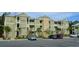 Modern building exterior with ample parking and landscaping at 35 Delray Dr. # 1-D, Murrells Inlet, SC 29576