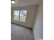 Well-lit bedroom with neutral wall colors and carpet at Tbd3 Ellwood Rd., Galivants Ferry, SC 29544