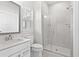 Bathroom with a glass shower and white vanity at 2321 Vera Way, Longs, SC 29568