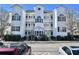 Three-story building exterior with parking lot and landscaping at 1530 Lanterns Rest Rd. # 302, Myrtle Beach, SC 29579