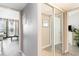 Bright hallway with mirrored closet and access to balcony at 2710 N Ocean Blvd. # 538, Myrtle Beach, SC 29577