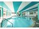 Indoor pool with teal colored walls and relaxing design at 2710 N Ocean Blvd. # 722, Myrtle Beach, SC 29577