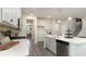 Open concept kitchen with island, stainless steel appliances, and ample cabinet space at 133 Fair Meadow Ct., Loris, SC 29569
