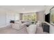 Spacious bonus room with a comfy sofa and large TV at 133 Fair Meadow Ct., Loris, SC 29569