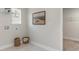Bright laundry room with shelving, a window, and space for storage at 133 Fair Meadow Ct., Loris, SC 29569