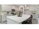 Large kitchen island with seating provides ample space for casual dining and meal prep at 133 Fair Meadow Ct., Loris, SC 29569