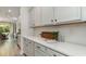 Additional kitchen counter space with white cabinets and quartz countertop at 133 Fair Meadow Ct., Loris, SC 29569