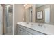 Bathroom with double vanity, a large mirror, and shower/tub combo at 133 Fair Meadow Ct., Loris, SC 29569