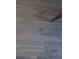 Light brown wood-look vinyl plank flooring at 14290 Ocean Hwy. # 103, Pawleys Island, SC 29585