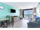 Living room with ocean view, light teal walls, and comfy seating at 1501 S Ocean Blvd. # 936, Myrtle Beach, SC 29577
