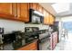 Kitchen with granite countertops and black appliances at 1501 S Ocean Blvd. # 936, Myrtle Beach, SC 29577