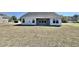 Newly built home with backyard and covered patio at 1424 Nathan Dr., Loris, SC 29569