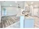 Open kitchen features granite countertops, a breakfast bar, and stainless steel appliances at 1424 Nathan Dr., Loris, SC 29569