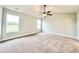 Spacious bedroom with carpet flooring and ceiling fan at 1424 Nathan Dr., Loris, SC 29569